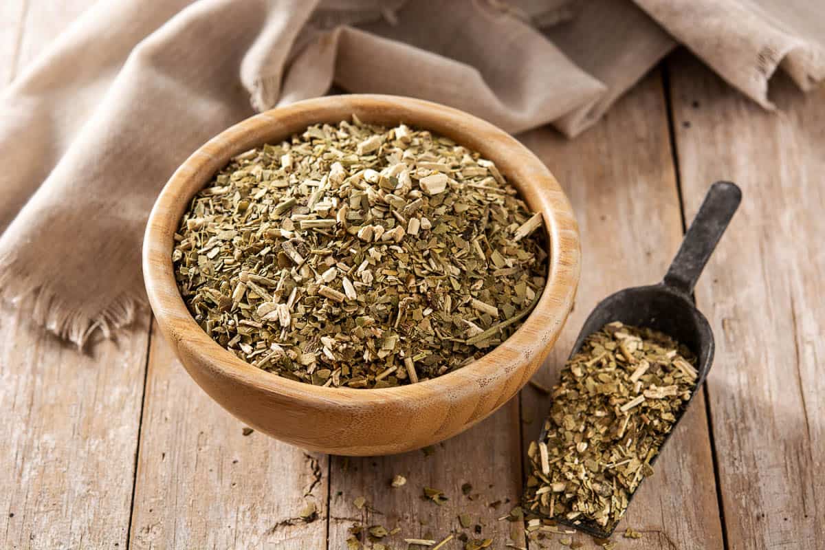 Yerba mate tea on wooden table.