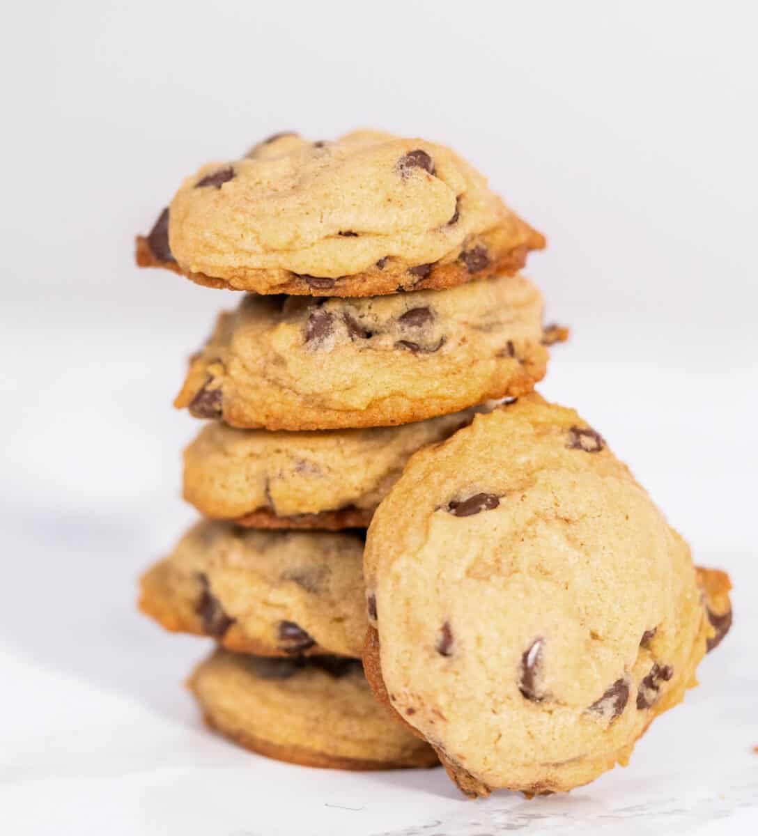 Stack of homemade soft chocolate chip cookies.