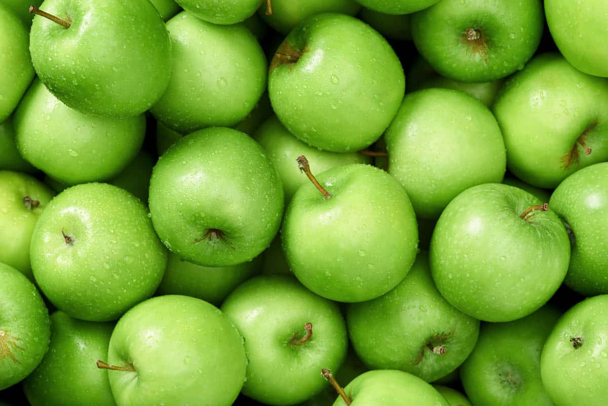 Green apple Raw fruit and vegetable backgrounds overhead perspective.