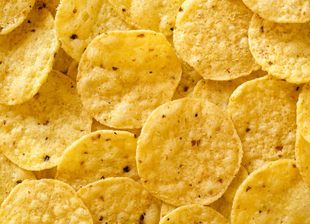 Overhead view of tasty tortilla chip rounds.