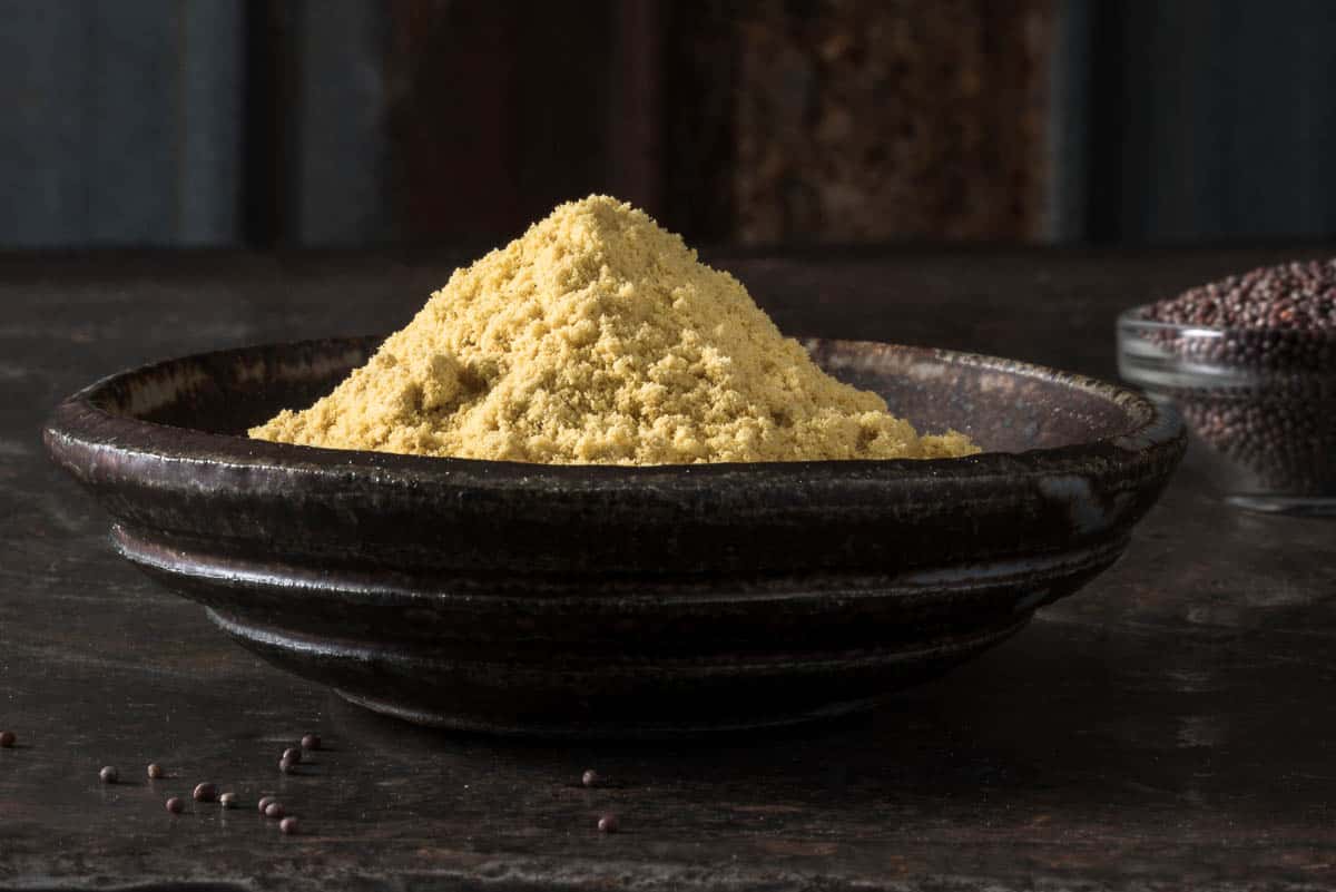 Ground Yellow Mustard in a Bowl.