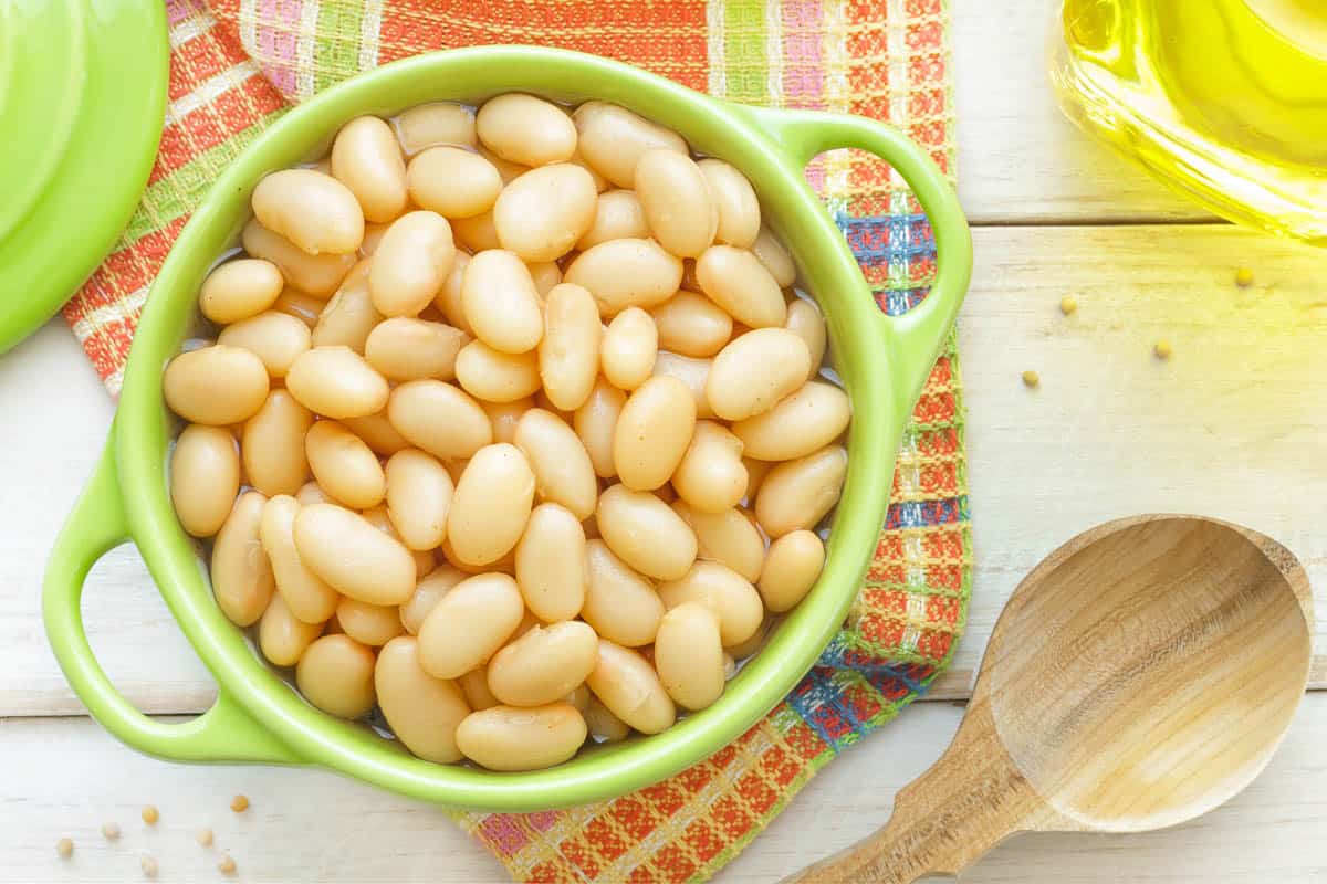 White beans in green dish.