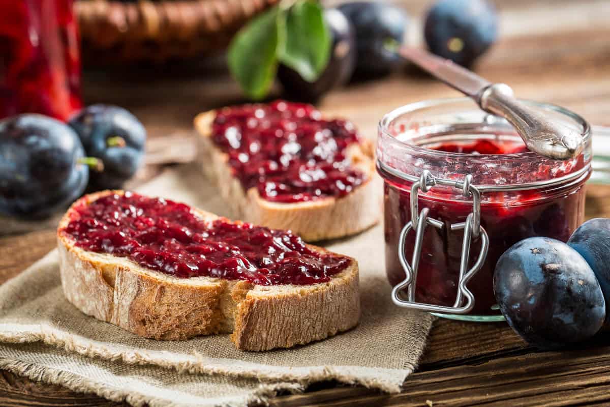 Closeup of sandwich with fresh plum jam.