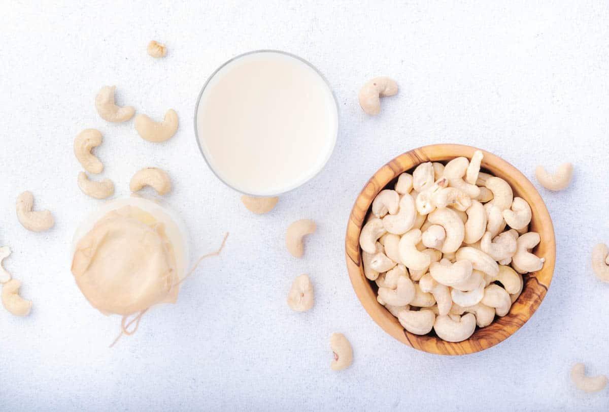 Vegan Cashew nut milk on white background.