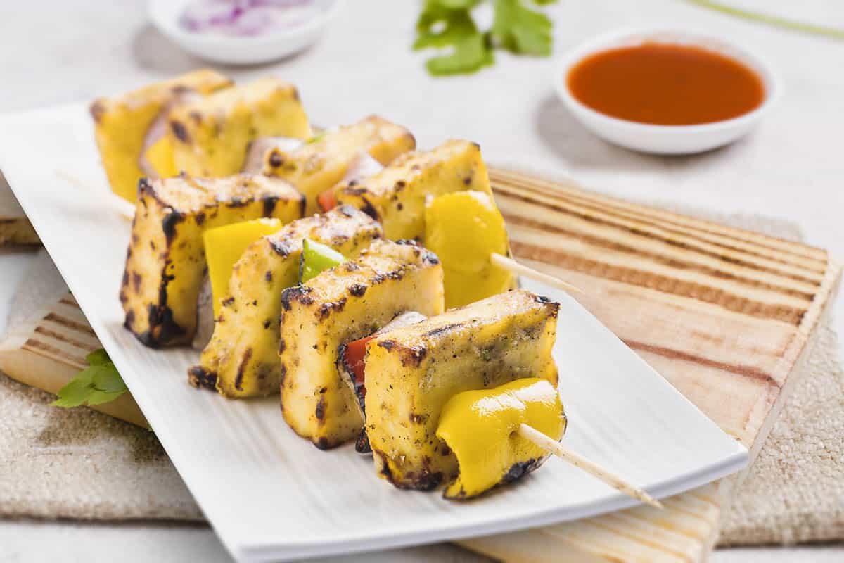 grilled paneer tikka on skewer with peppers