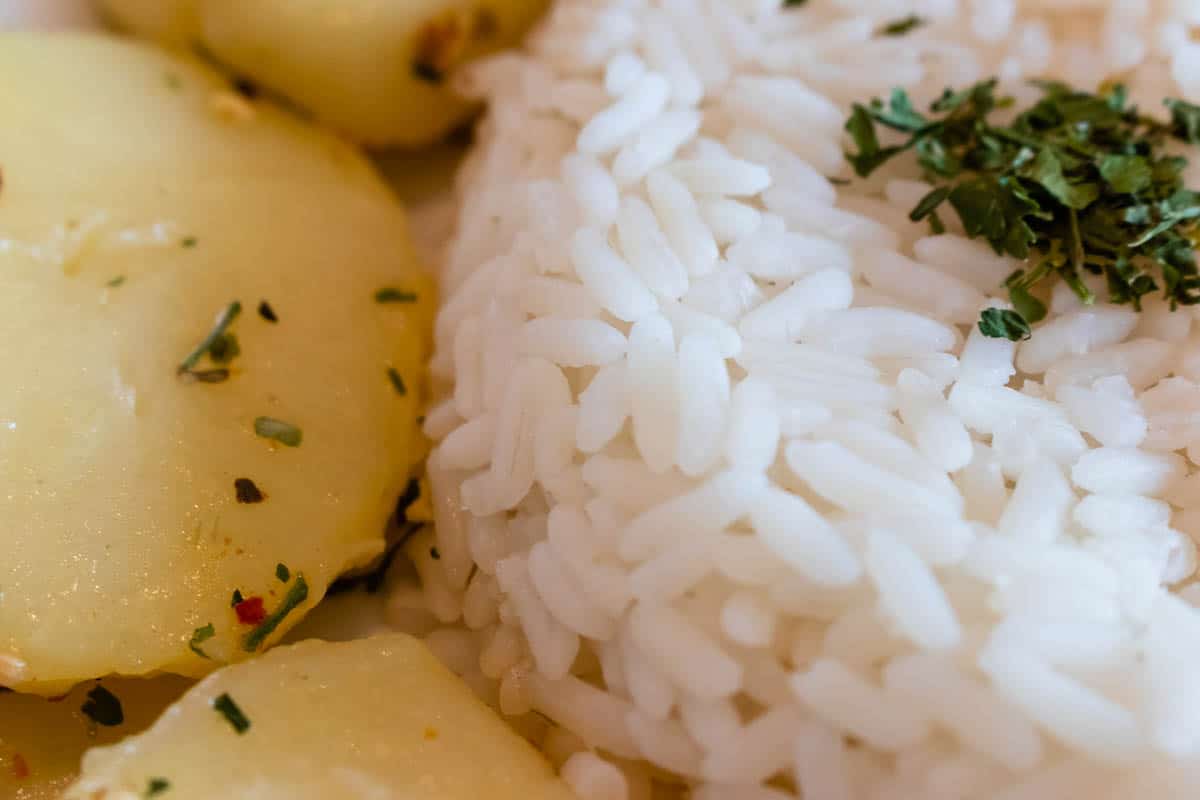 white rice and sauté potato close up.