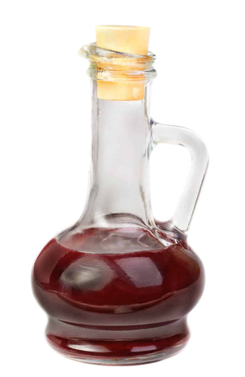 Small decanter with red wine vinegar.