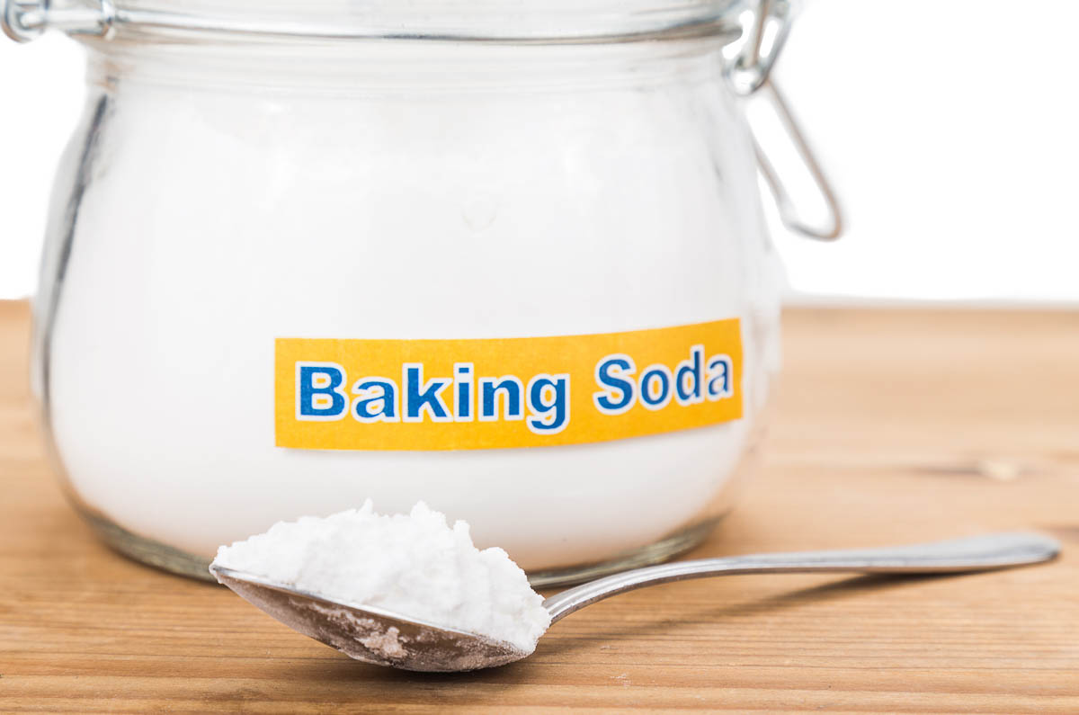 Jar and spoonful of baking soda.