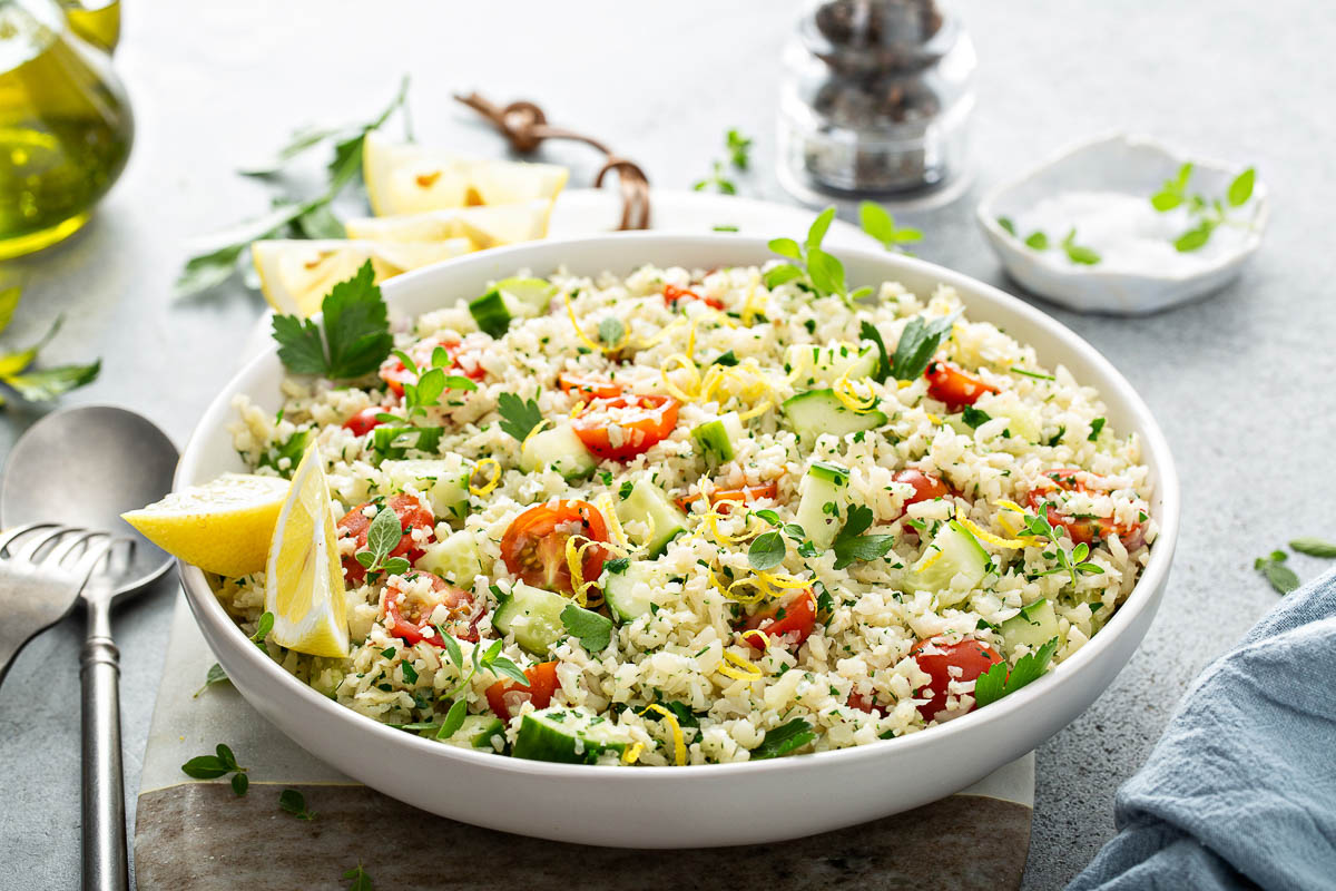 Tabbouleh salad with cauliflower rice, herbs and vegetables.