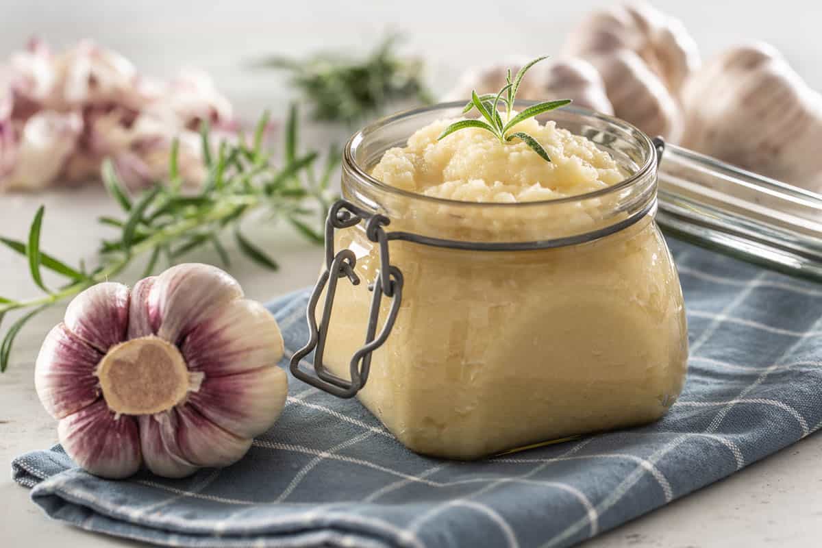 garlic paste in a glass jar.