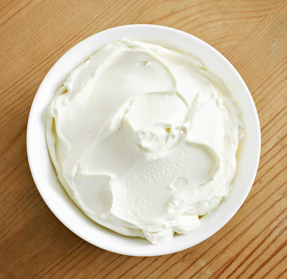 cream cheese in white bowl.